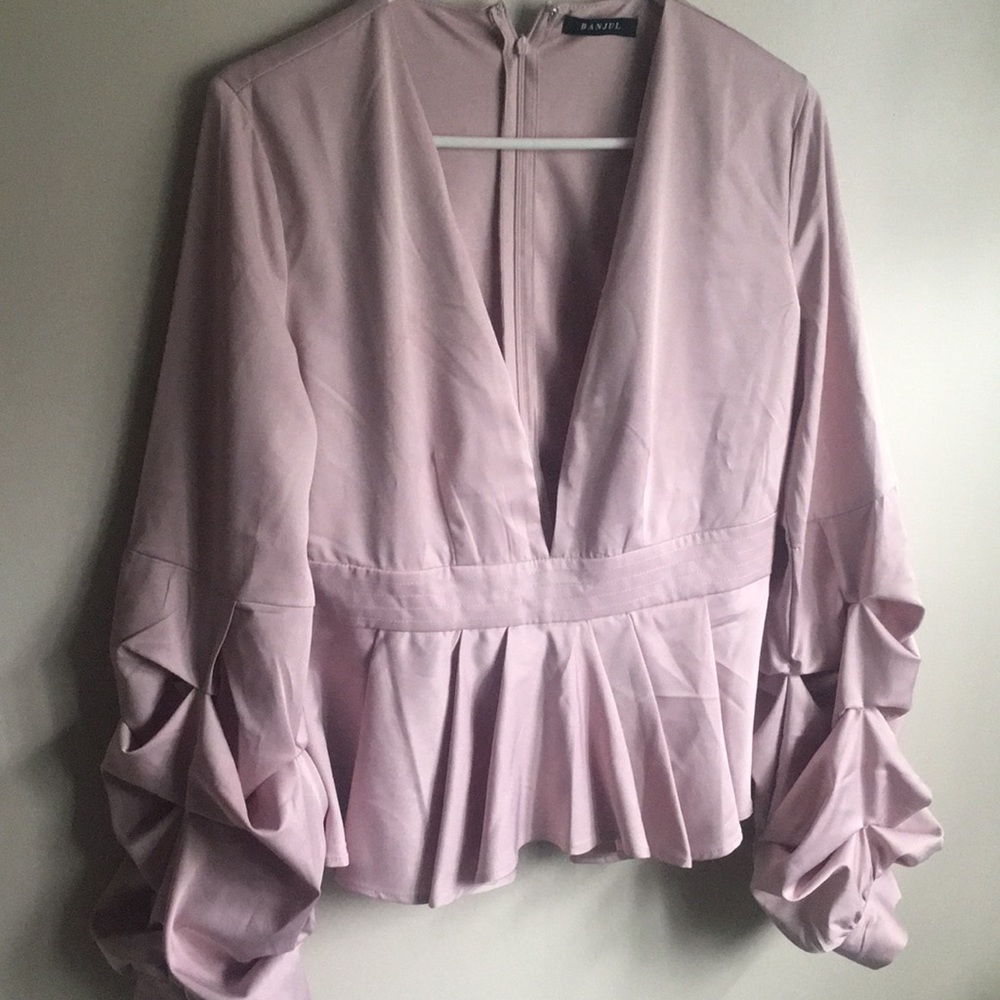 Peplum long sleeved blouse